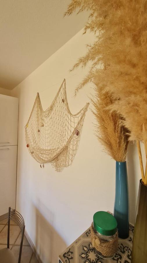 Appartement Casa Il Pescatore à Porto Pozzo Extérieur photo