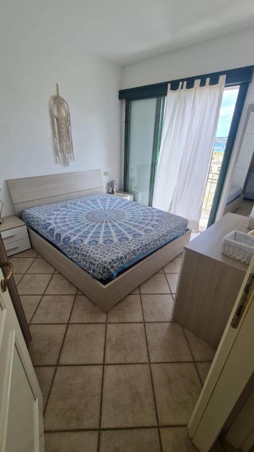 Appartement Casa Il Pescatore à Porto Pozzo Extérieur photo